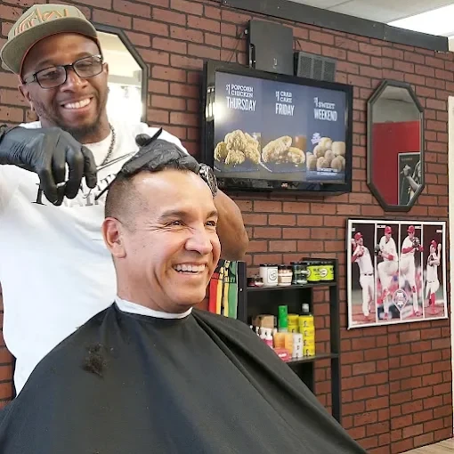 Dee, Barber & Stylist